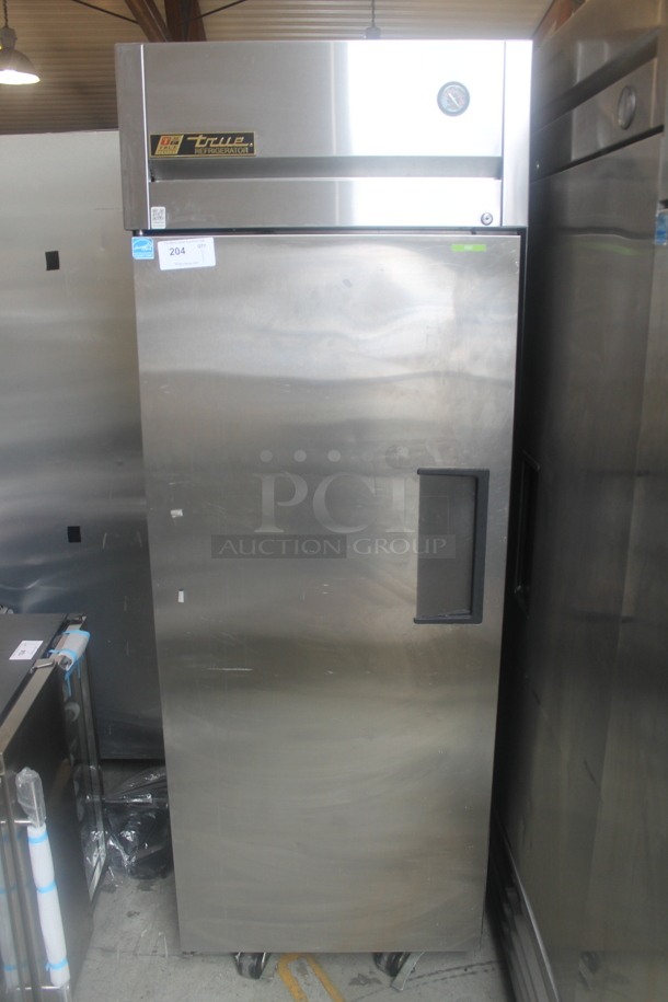 2015 True TG1R-1S ENERGY STAR Stainless Steel Commercial Single Door Reach In Cooler w/ Poly Coated Racks on Commercial Casters. 115 Volts, 1 Phase. Tested and Working! - Image 1 of 8