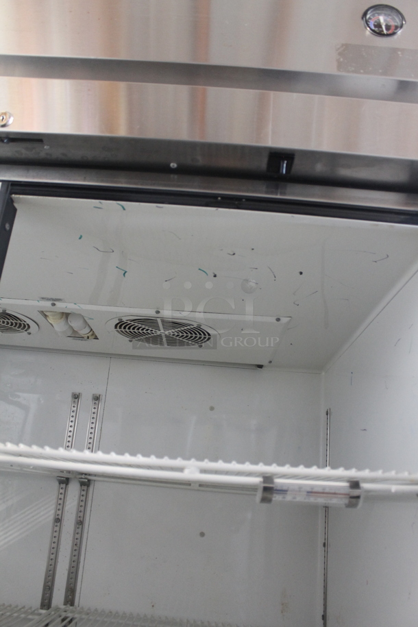 2014 True TG2R-2S ENERGY STAR Stainless Steel Commercial 2 Door Reach In Cooler w/ Poly Coated Racks on Commercial Casters. 115 Volts, 1 Phase. Tested and Working! - Image 6 of 7