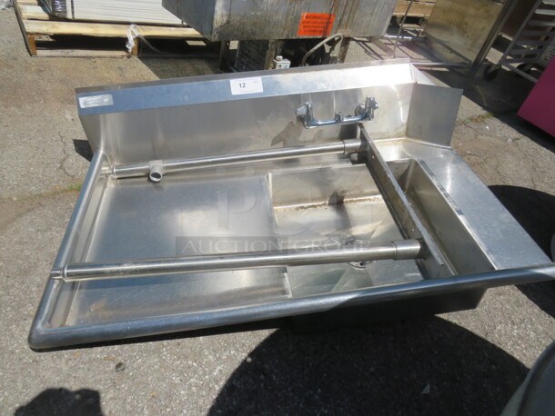 One Stainless Steel Dirty Side Dishwasher Table With Sink. Needs Legs Attached. 48X31X47 - Image 1 of 1