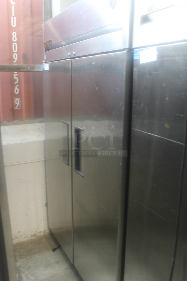 2014 True TG2R-2S ENERGY STAR Stainless Steel Commercial Two Door Reach In Cooler w/ Poly Coated Racks on Commercial Casters. 115 Volts, 1 Phase. Tested and Working! - Image 1 of 5