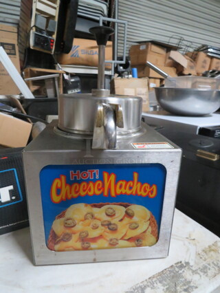 One APW WYOTT Nacho Cheese Dispenser. Model# LCCW MKVII. 120 Volt. 