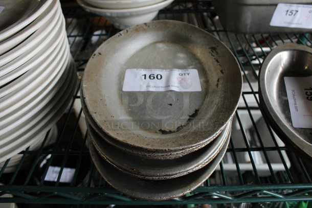 8 Various Metal Oval Plates. Includes 11.5x8x1. 8 Times Your Bid!