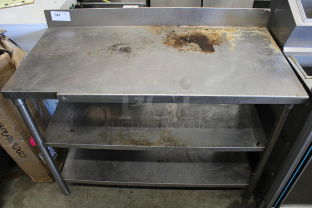 Stainless Steel Table w/ Back Splash and 2 Metal Under Shelves. 47x22x38.5 - Image 1 of 3