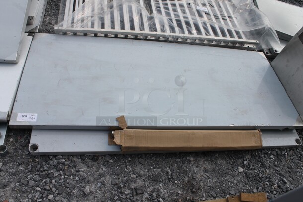 BRAND NEW SCRATCH AND DENT! Regency Spec Line Commercial Stainless Steel Disassembled Work Table With Undershelf And Legs - Image 1 of 6