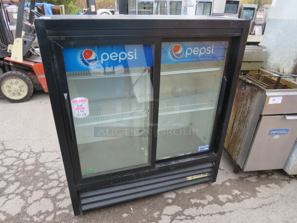 One True 2 Door Glass Display Refrigerator With 2 Racks. WORKS GREAT! Model# GDM-41SL-54-LD. 115 Volt. 47.5X21X54.5 - Image 1 of 2