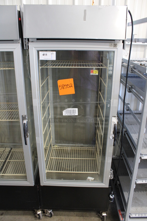Hatco Model PFST-1X Stainless Steel Commercial Heated Single Door Reach In Merchandiser w/ Poly Rack on Commercial Casters. 120 Volts, 1 Phase. 24.5x24x70. Tested and Does Not Power On