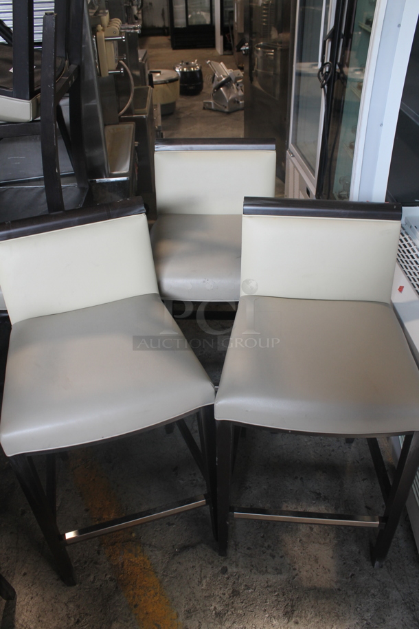 3 Bar Height Vinyl Cream Colored Cushioned Chairs With Brown Legs. Cosmetic Condition May Vary. 3 Times Your Bid!