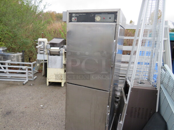One Henny Penny Pass Thru Heat And Hold On Casters. Model# HC900. 27X34X71. $8030.40