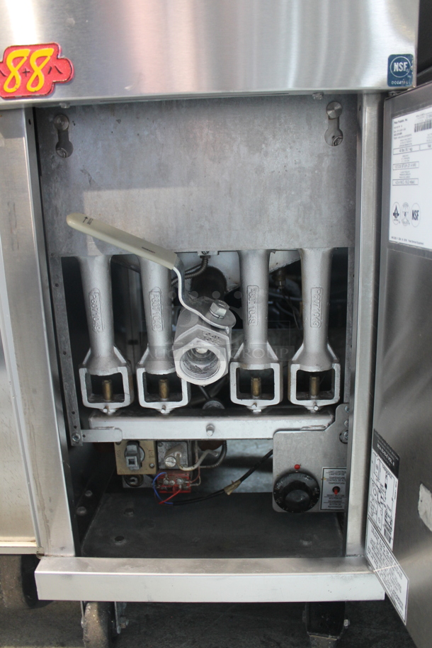 2019 Pitco Frialator 40D Stainless Steel Commercial Floor Style Natural Gas Powered Deep Fat Fryer w/ 2 Metal Fry Baskets on Commercial Casters. 107,000 BTU.  - Image 5 of 7