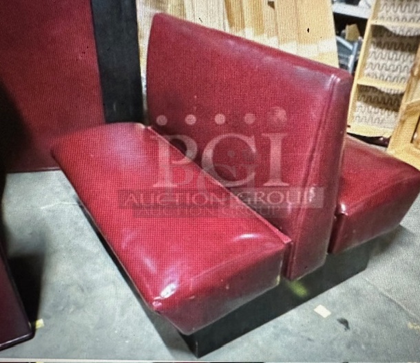 One Double Sided Burgundy Cushioned Booth. 44X48X36