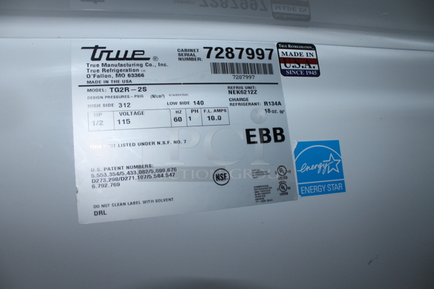 2012 True TG2R-2S ENERGY STAR Stainless Steel Commercial 2 Door Reach In Cooler w/ Poly Coated Racks on Commercial Casters. 115 Volts, 1 Phase. Tested and Working! - Image 4 of 7
