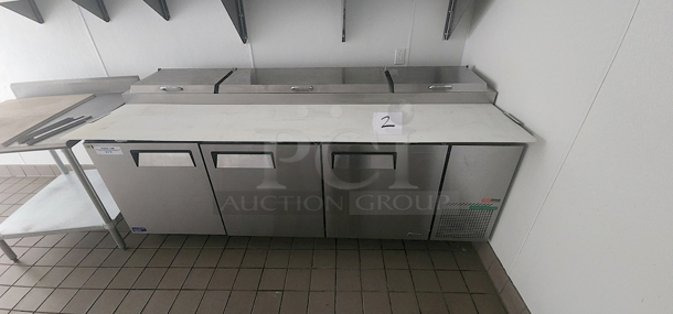 Still Under Warranty!! Turbo Air TPR-93SD-N 93" Super Deluxe Pizza Prep Table w/ Refrigerated Base. On Commercial Casters. R-290 Hydrocarbon Refrigerant. 115V 93-3/8"x32-1/4"x 36" LIKE NEW! In Perfect Working Order! Includes Receipts and Paper Work. 
*Located In Bakersfield, CA.*
*Shipping Available*  - Image 3 of 4