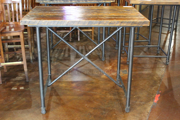HIGH QUALITY! Industrial Style, Solid Wood Table On Steel Frame With Steel Casters.
48x33-1/4x41-1/2
