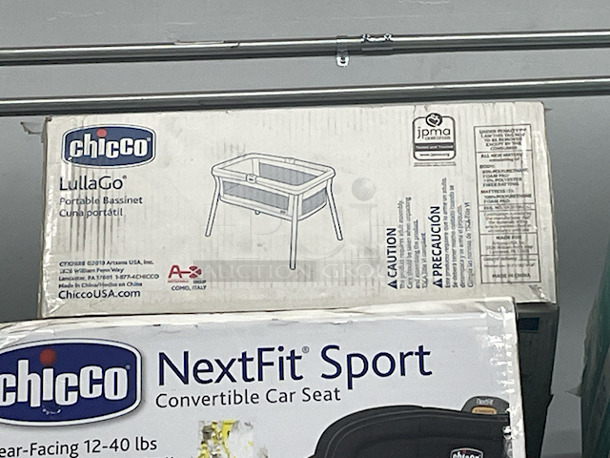 MASSIVE LOT! (3) Little Tikes 2-In-1 Snug & Secure Swings – 1 Blue, 2 Pink; (17) Nuby Water Resistant Baby Bibs (assorted colors); (1) Graco “Caden Fashion” Comfy Cruiser™ Travel System With Snugride® 30; (1) Allen YOOGO CZ2 Convertible Cargo Trailer → Handy Pull Cart,  (1) Delta Children Sweet Slumber Bassinet, (1) Chicco LullaGo Portable Bassinet, (1) Chicco NextFit Sport Convertible Car Seat, (2) Evenflo Omni Plus Modular Travel System – Includes LITEMAX Rear-Facing Infant Car Seat, (1) Baby Trend EZ Ride Girl 35 - Includes NEW 4-35 Ibs Infant Car Seat , (1) Evenflo Nurture Infant Car Seat Base. 11x Your Bid - Image 10 of 12