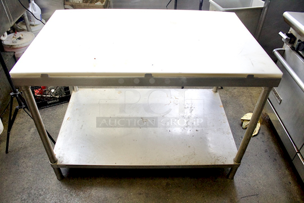 HEAVY DUTY! Stainless Steel Table With Full Size Cutting Board and Under-Shelf. Aprox. 48x30x34 - Image 1 of 4