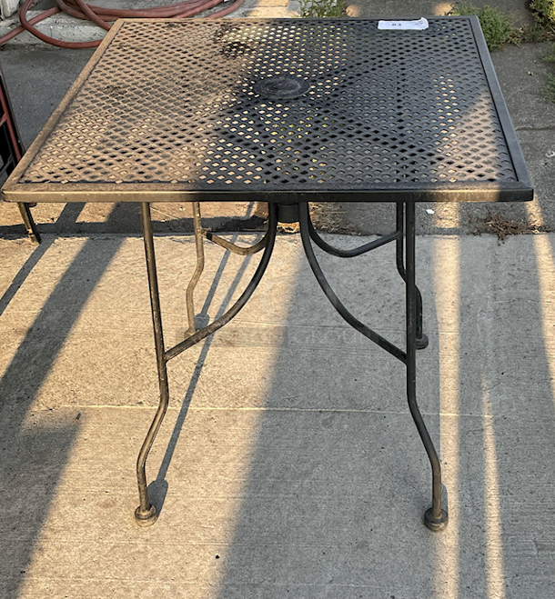 OUTSTANDING! Outdoor Patio Dinning Table With Umbrella Hole, Black, Metal, Seats 4.   - Image 1 of 3