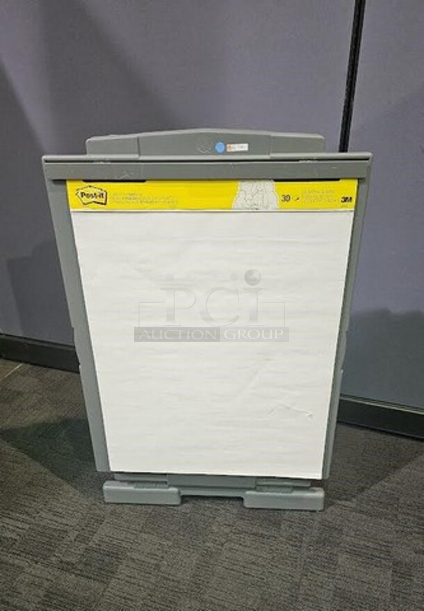 Quartet folding easel- gray in color. In good condition- minor scuffs and cosmetic marks from normal wear and tear. 44"H x 28"W x 18"D. 

  - Image 1 of 3
