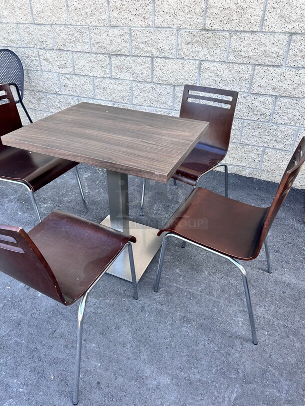  A Set Of Wooden Table and 4 Chairs
24x30x30  - Image 1 of 5
