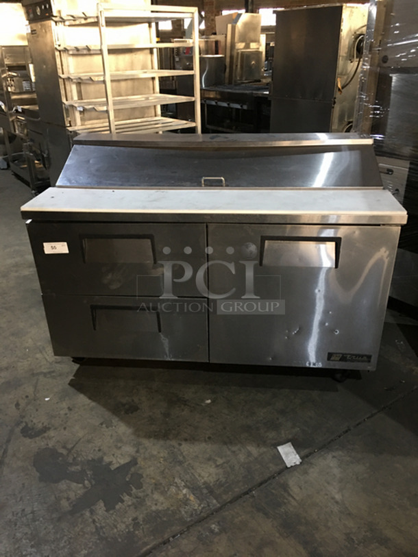NICE! True Refrigerated Sandwich Prep Table! With Underneath Storage Space! With 2 Drawers! With Poly Coated Rack! With Commercial Cutting Board! All Stainless Steel! On Casters! Model: TSSU6016D2 SN: 8411708 115V 60HZ 1 Phase