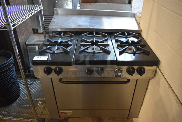 Southbend X336D Stainless Steel Commercial Natural Gas Powered 6 Burner Range w/ Oven and Over Shelf. 37x31x37
