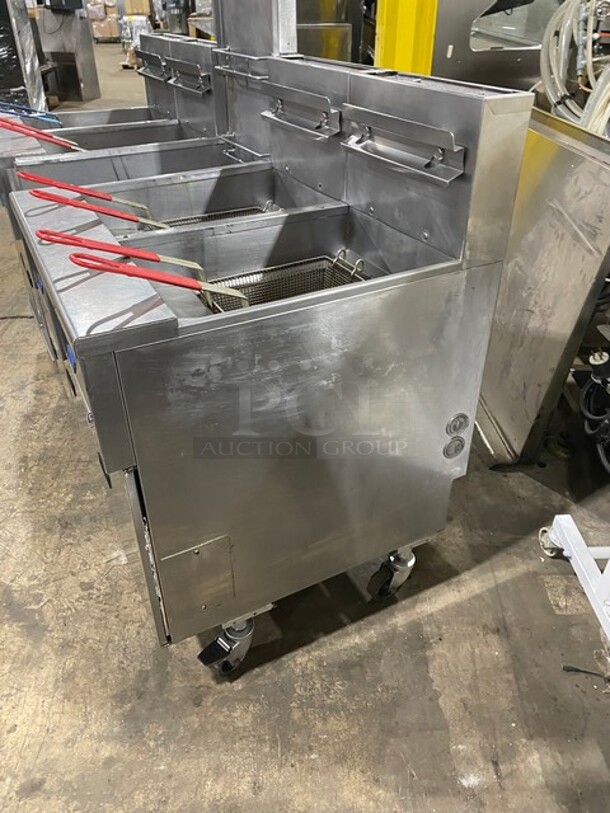 GREAT! Pitco Frialator 4 Bay Natural Gas Powered Commercial Deep Fat Fryer! With Middle Dump Station! With 8 Frying Baskets! With Oil Filter System! All Stainless Steel! MODEL: SGH50 SN: G11BD005229! 115V! On Casters! Working When Removed!  - Image 2 of 12