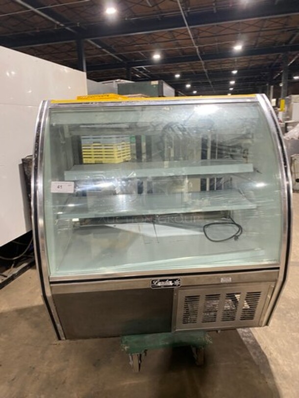 2010 Leader Commercial Refrigerated Bakery Display Case Merchandiser! With Curved Front Glass! With Rear Access Doors! Stainless Steel Body! Model: RHDL48 SN: PT10M1682D 115V 60HZ 1 Phase
