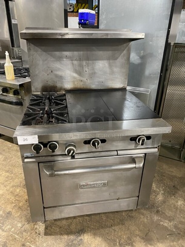 Garland Commercial Natural Gas Powered 2 Burner Stove With Hot Plate! With Oven Underneath! With Raised Back Splash And Salamander Shelf! All Stainless Steel! On Legs!