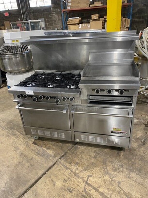 GREAT FIND! Garland Commercial Gas Powered 6 Burner Stove With Right Side Flat Griddle! Griddle Has Side Splashes! With Raised Back Splash And Salamander Shelf! With 2 Oven Underneath! Metal Oven Racks! All Stainless Steel! On Casters!