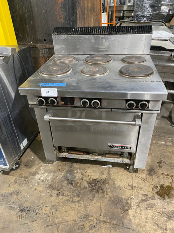 Garland Electric Powered 6 Burner Range! With Full Size Oven Underneath! With Back Splash! All Stainless Steel Body! On Casters!