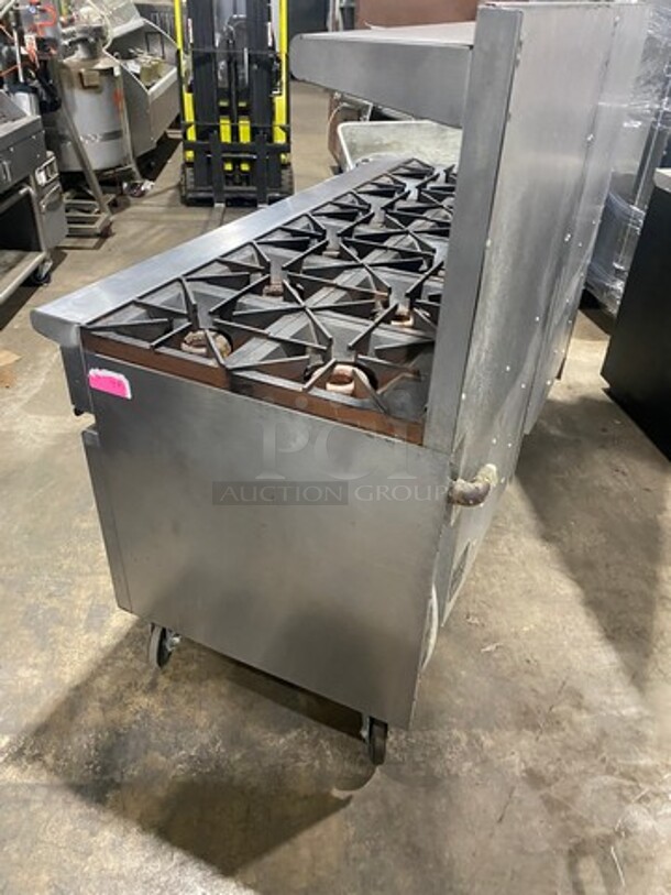 Vulcan Commercial Natural Gas Powered 12 Burner Stove! With Raised Back Splash And Salamander Shelf! With 2 Oven Underneath! All Stainless Steel! On Casters! WORKING WHEN REMOVED! Model: G72SS1AA SN: 659011300 - Image 4 of 11