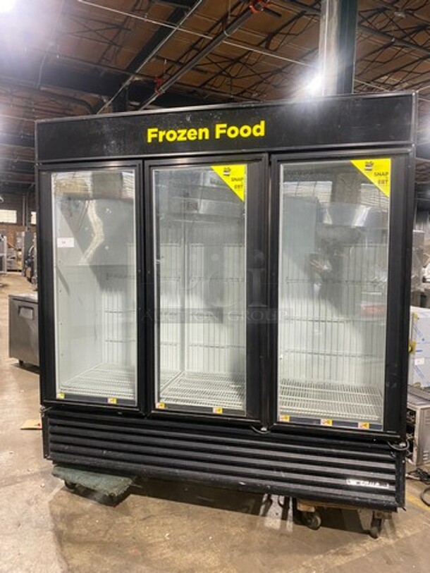 True Commercial 3 Door Reach In Freezer Merchandiser! With View Through Doors! With Poly Coated Racks! Model: GDM72F SN: 5352072 115/208/230V 60HZ 1 Phase