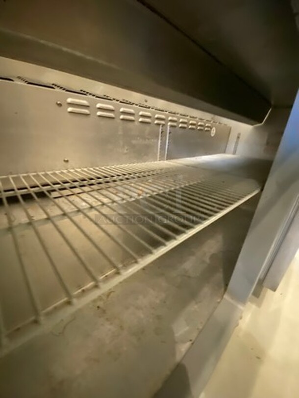 Continental Commercial Refrigerated Sandwich Prep Table! With Commercial Cutting Board! With 2 Door Storage Space Underneath! All Stainless Steel! On Casters! WORKING WHEN REMOVED! Model: SW6016 SN: 15875040 115V 60HZ 1 Phase - Image 6 of 9