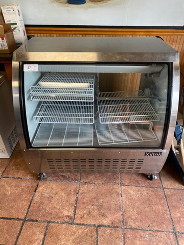 Xiltec Commercial Refrigerated Deli/ Meat Display Case Merchandiser! With Curved Front Glass! With Rear Access Doors! WORKING WHEN REMOVED! Model: XDC120HC SN: 6944315019120111