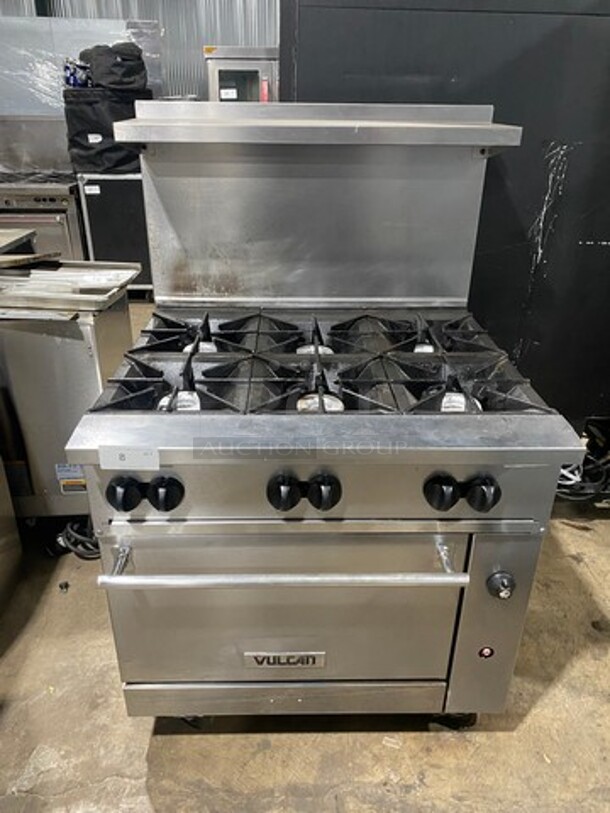 Vulcan Commercial Natural Gas Powered 6 Burner Stove! With Raised Back Splash And Salamander Shelf! With Oven Underneath! All Stainless Steel! Model: 36S6BN SN: 481938247