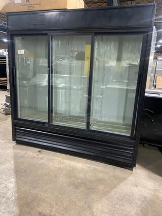 True Commercial 3 Door Reach In Cooler Merchandiser! With View Through Doors! Poly Coated Racks! Model: GDM69 SN: 4009937 115V 60HZ 1 Phase