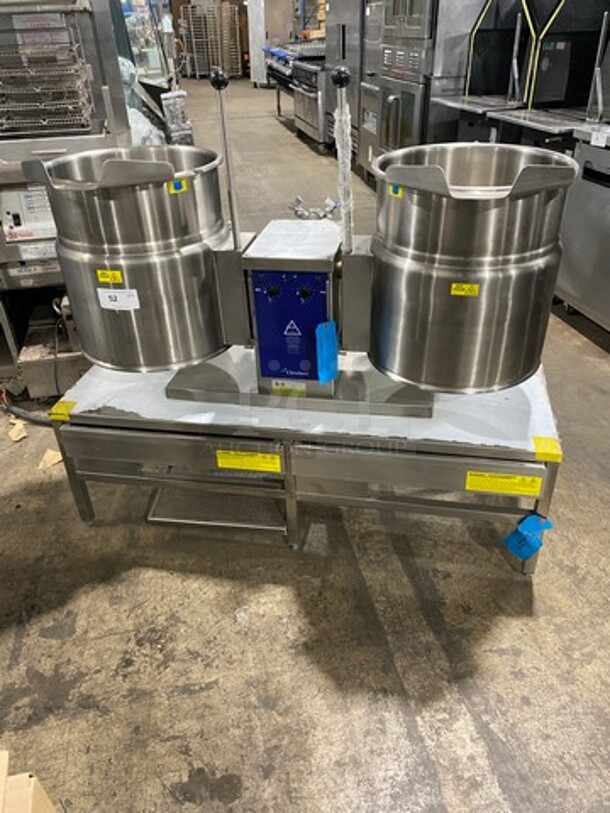 NEW! NEVER USED! Cleveland Commercial Countertop Electric Powered Jacketed Tilting Soup Kettle! On Equipment Stand! All Stainless Steel! On Legs! Model: TKET12T SN: WT680804C01 240V 60HZ 3 Phase - Image 1 of 10