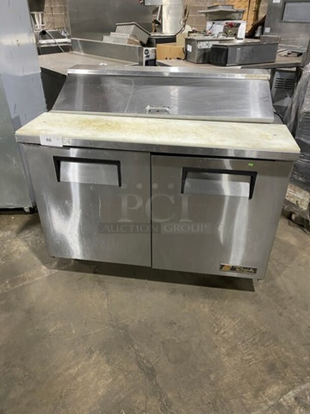 FAB! LATE MODEL! 2014 True Commercial Refrigerated Sandwich Prep Table! With Commercial Cutting Board! With 2 Door Underneath Storage Space! Poly Coated Racks! All Stainless Steel! On Casters! WORKING WHEN REMOVED! Model: TSSU4812 SN: 8067233 115V 60HZ 1 Phase