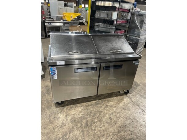 Dukers Commercial Refrigerated Sandwich/Salad Prep Table! All Stainless Steel! With 2 Door Storage Space Underneath! With Poly Coated Racks! Model DSP 60 Serial DUK211103! 115V! On Casters! - Image 1 of 9