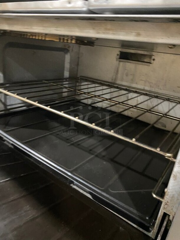 Nice! Sunfire All Stainless Steel Natural Gas 6 Burner Stove! With an Underneath Full Size Stove! Raised Back Splash And Salamander Shelf! On Casters! - Image 6 of 9