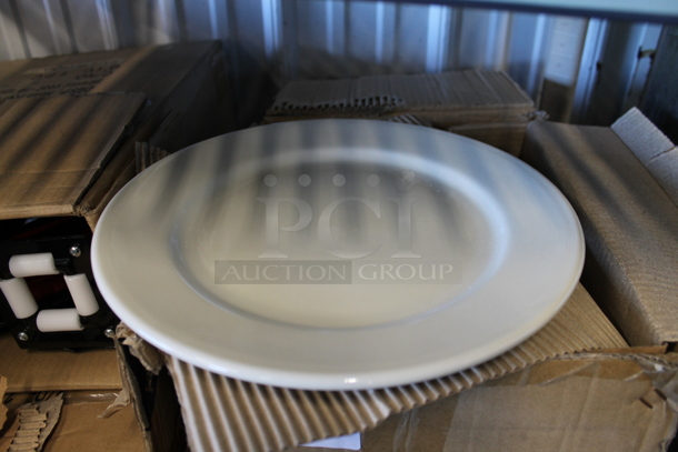 Box of 12 BRAND NEW! TriMark 12" White Ceramic Plates. - Image 1 of 6