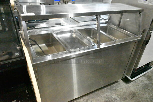 Randell RAN HTD-4S Stainless Steel Commercial Floor Style 4 Well Steam Table w/ Tray Slide and Sneeze Guard on Commercial Casters. 120 Volts, 1 Phase. Tested and Working! - Image 1 of 9