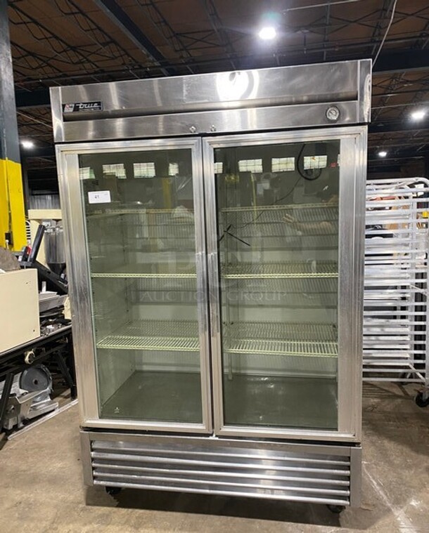 True Stainless Steel 2 Door Glass Display Cooler With Poly Racks On Casters! Model T49G SN:5150370 115V 1PH - Item #1113619