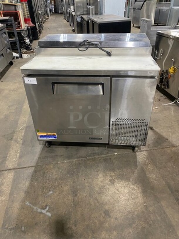 Turbo Air Commercial Refrigerated Pizza Prep Table! With Commercial Cutting Board! With Single Door Storage Space! Poly Coated Rack! All Stainless Steel! On Casters! Model: TPR44SD SN: TP4RA0100B 115V 60HZ 1 Phase