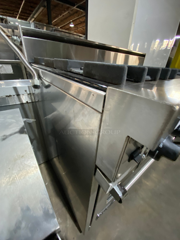 AMAZING! Viking Duel Fuel Powered 4 Burner Stove! With Built In Flat And Ribbed Griddle! With 2 Oven Underneath! Metal Oven Racks! All Stainless Steel! On Legs! - Image 2 of 12