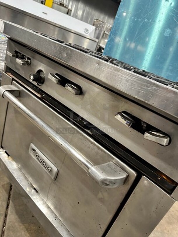 Garland Commercial Natural Gas Powered 6 Burner Stove! With Raised Back Splash! With Oven Underneath! Metal Oven Rack! All Stainless Steel! On Casters! - Image 8 of 10