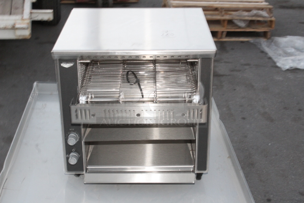 BRAND NEW SCRATCH & DENT! Vollrath CT2H-120250 JT1H Conveyor Toaster with 2 1/2" Opening - 120V, 1600W. S/N: 0194-01767391-008. Minor denting. Glass heating tube is good. 14-1/2x16-1/2x14-3/16 - Image 2 of 6