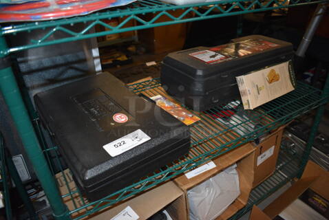 ALL ONE MONEY! Tier Lot of Various Items Including Steel Floor Jack with Case, Tool Kit, Light Bulbs, and Gloves