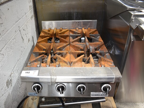 BRAND NEW SCRATCH AND DENT! Garland GTOG24-4 Stainless Steel Commercial Countertop Natural Gas Powered 4 Burner Range. 120,000 BTU. - Image 2 of 8