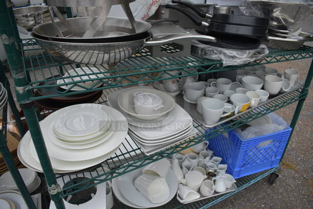 ALL ONE MONEY! Lot of 6 Tiers of Various Smallwares Including White Ceramic Plates, Mugs and Metal Bowls. Does Not Include Shelving Unit.  - Image 5 of 6