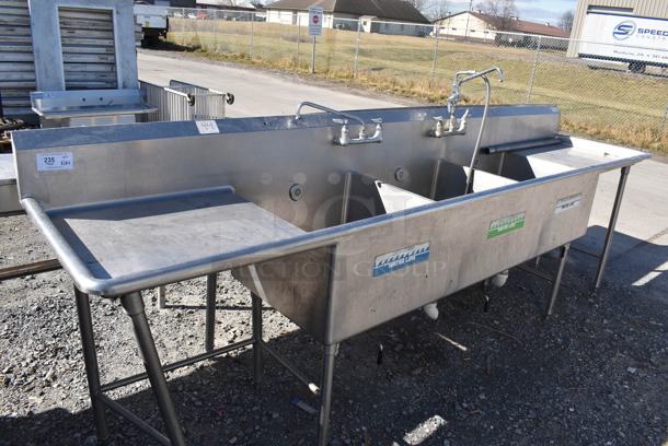 Stainless Steel 3 Bay Sink w/ Dual Drain Boards, 2 Faucets and 2 Handle Sets. 121x27x54.5. Bays 24x24x14. Drain Boards 25x24x1